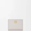 Anagram Compact Wallet in Pebble Grained Calfskin Anagram Compact Wallet in Pebble Grained Calfskin