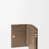 Anagram Compact Wallet in Pebble Grained Calfskin Anagram Compact Wallet in Pebble Grained Calfskin