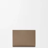 Anagram Compact Wallet in Pebble Grained Calfskin Anagram Compact Wallet in Pebble Grained Calfskin