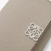 Anagram Trifold Wallet in Pebble Grained Calfskin Anagram Trifold Wallet in Pebble Grained Calfskin