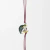 Apple Charm in Brass and Calfskin Apple Charm in Brass and Calfskin