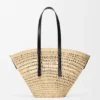 Large Braid Basket in Iraca Palm and Calfskin Large Braid Basket in Iraca Palm and Calfskin