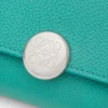 Pebble Small Vertical Wallet in Pebble Grained Calfskin Pebble Small Vertical Wallet in Pebble Grained Calfskin