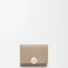 Pebble Trifold Wallet in Pebble Grained Calfskin Pebble Trifold Wallet in Pebble Grained Calfskin