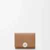 Pebble Trifold Wallet in Pebble Grained Calfskin Pebble Trifold Wallet in Pebble Grained Calfskin