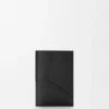Puzzle Passport Cover in Supple Grained Calfskin Puzzle Passport Cover in Supple Grained Calfskin