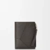Puzzle Slim Compact Wallet in Supple Grained Calfskin Puzzle Slim Compact Wallet in Supple Grained Calfskin