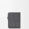 Puzzle Slim Compact Wallet in Supple Grained Calfskin Puzzle Slim Compact Wallet in Supple Grained Calfskin