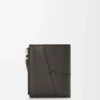 Puzzle Slim Compact Wallet in Supple Grained Calfskin Puzzle Slim Compact Wallet in Supple Grained Calfskin