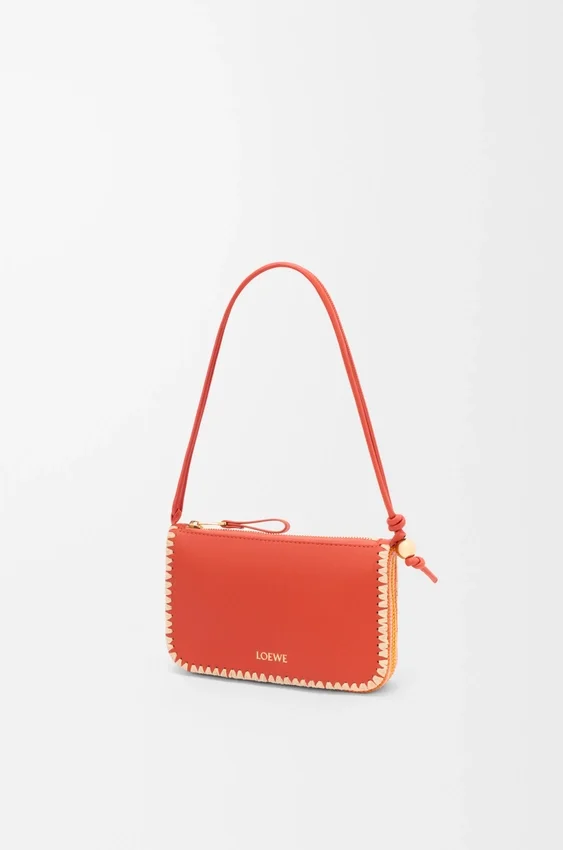 Rio Pouch in Classic Calfskin and Raffia Rio Pouch in Classic Calfskin and Raffia